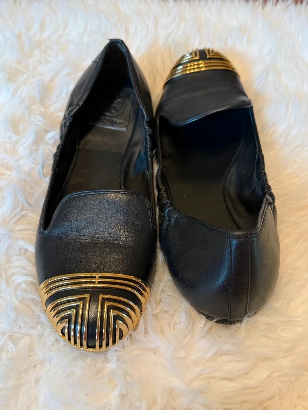 Tory Burch Black Leather Flats with Gold Decorative Cap Toe